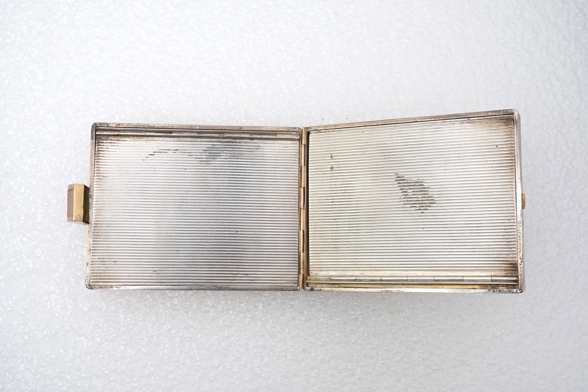 Boucheron, a silver gilt and ruby vanity case, France, 1940s